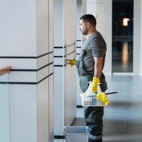 full shot man with cleaning products 23 2149345540