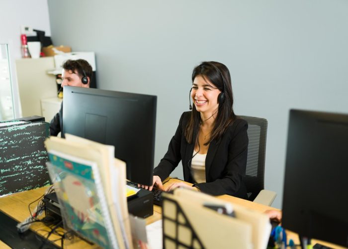 happy sales representative making big sale work excited young woman with headset laughing while speaking customer call center 662251 413